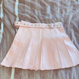 Pastel pink pleated skirt with heart belt